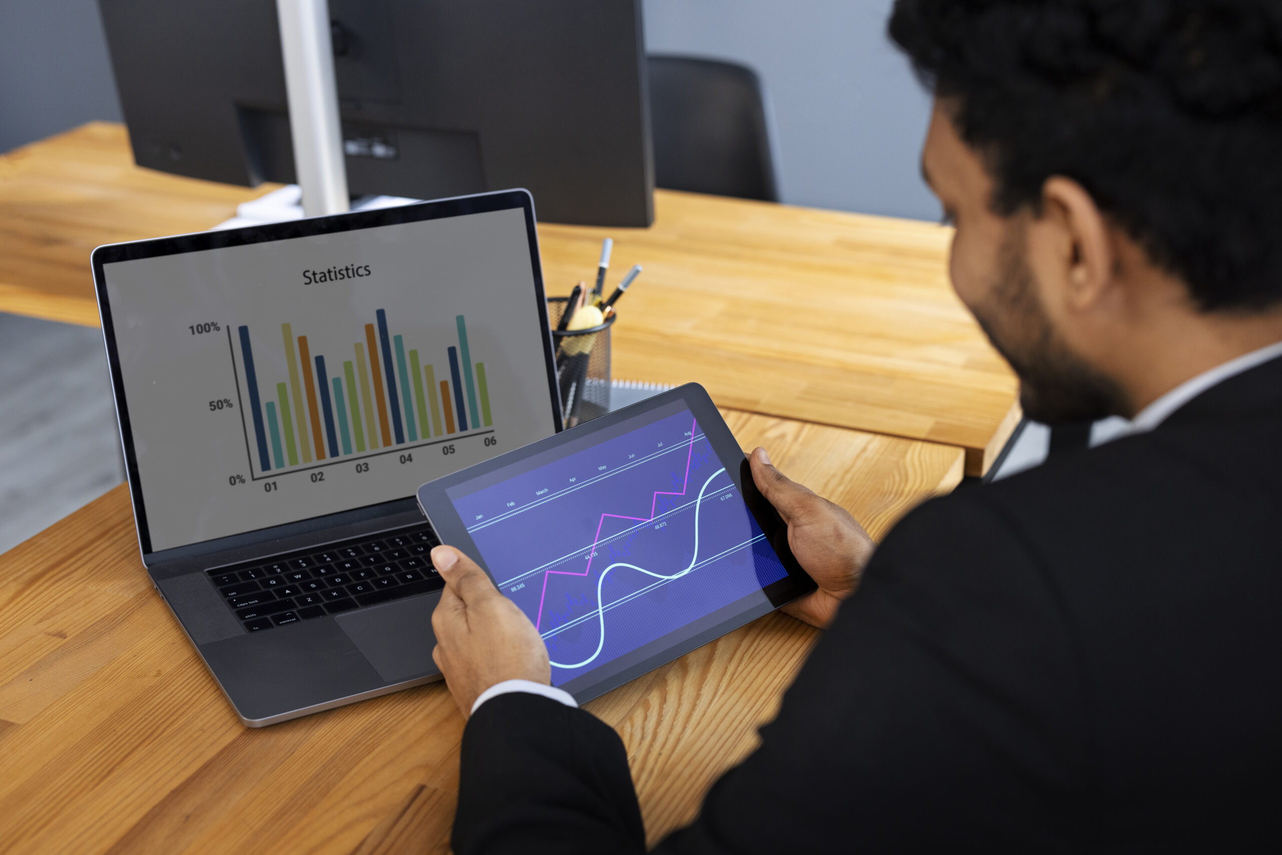 business-person-looking-finance-graphs