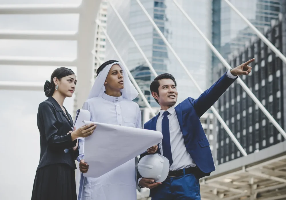Business coworkers discussing new ideas and brainstorming together looking at new project document.