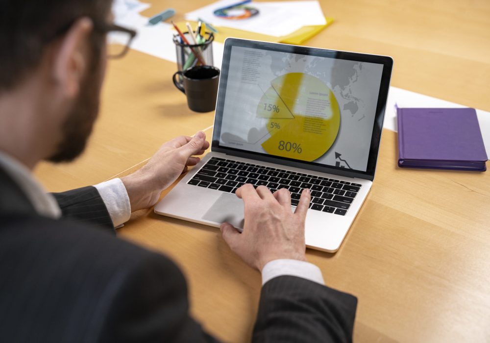 close-up-man-working-with-laptop