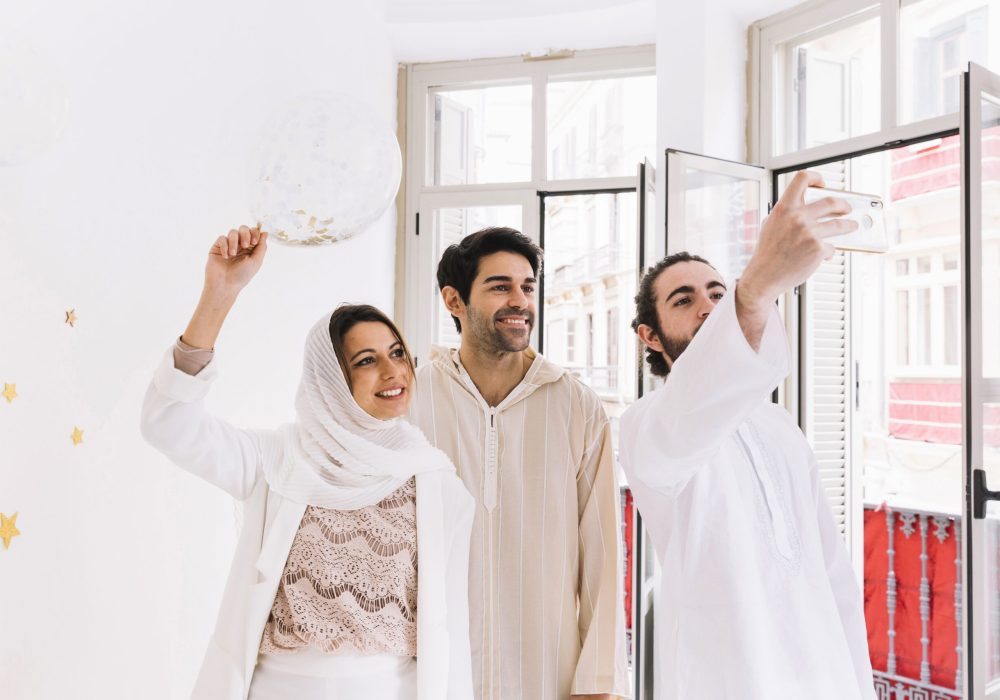 eid-concept-with-group-friends-taking-selfie