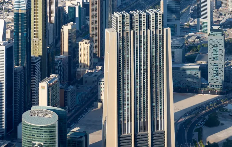 Vertical view of Dubai city from the top of a tower.